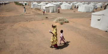 Sudanese children displaced by conflict receive humanitarian assistance. - AP Photo/marwan Ali, File