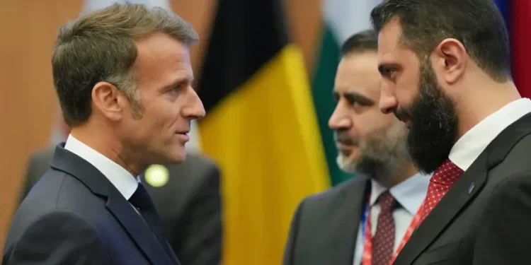 French President Emmanuel Macron arrives in Damascus for official visit. - AP Photo/Petros Karadjias, FIle