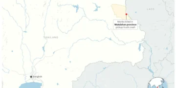 Emergency responders at the scene after a pickup truck struck Buddhist monks in Thailand. - © OpenStreetMap contributors - Graphic: Will Jarrett Associated Press