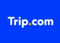 Trip.com app logo displayed on the home screen of a smartphone for editorial illustration of the online travel platform.