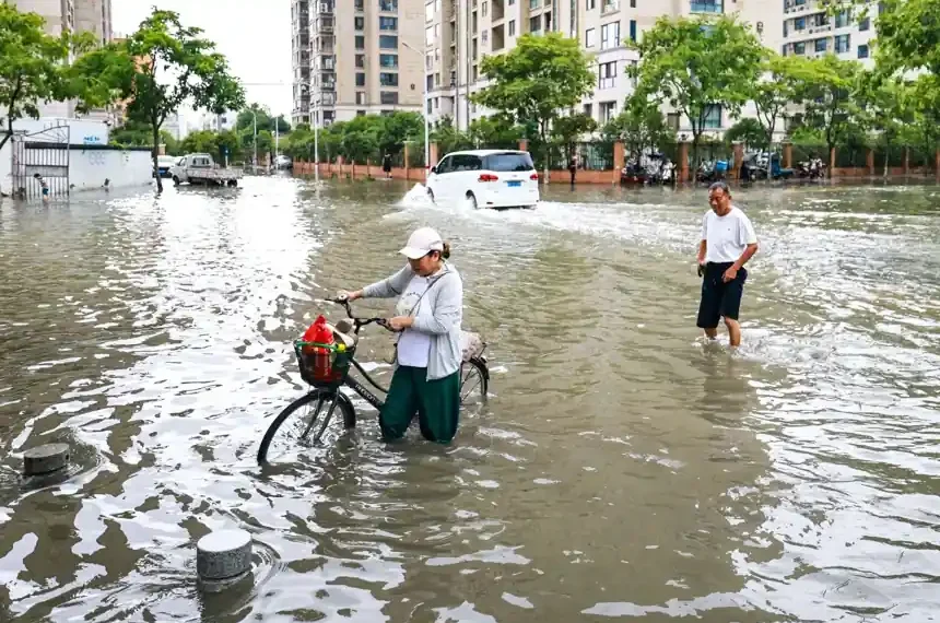 Strong winds and rain from Typhoon Bavi affect eastern China after landfall. - Jiang Han/Xinhua via AP
