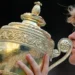 Jannik Sinner celebrates after winning the Wimbledon men's singles title. - AP Photo/Kin Cheung