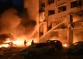 Emergency responders search damaged apartment buildings after a Russian missile attack in Kyiv. - AP Photo/Danylo Antoniuk