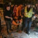 Emergency workers search damaged buildings after Russian missile strikes in Kyiv. - AP Photo/Danylo Antoniuk