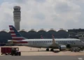 Commercial aircraft parked at airport gates amid rising airline fuel costs. - AP Photo/Carolyn Kaster, File