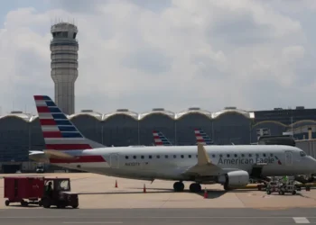 Commercial aircraft parked at airport gates amid rising airline fuel costs. - AP Photo/Carolyn Kaster, File