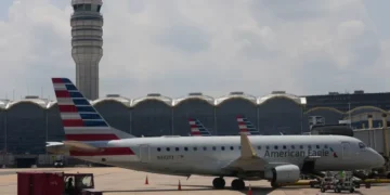 Commercial aircraft parked at airport gates amid rising airline fuel costs. - AP Photo/Carolyn Kaster, File