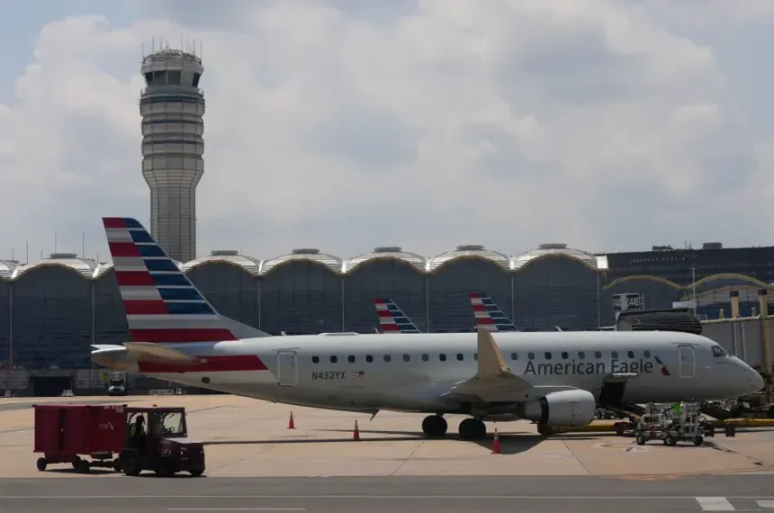 Commercial aircraft parked at airport gates amid rising airline fuel costs. - AP Photo/Carolyn Kaster, File