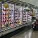 Motorists refuel at a gas station as consumer confidence improves. - AP Photo/Nam Y. Huh