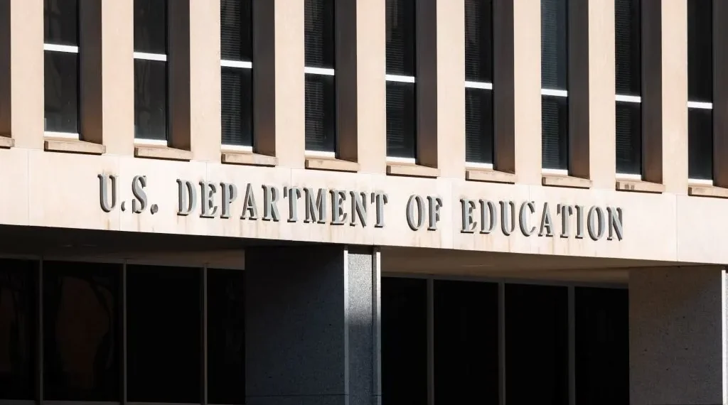 Front façade of the U.S. Department of Education headquarters building in Washington, D.C., with the agency's name displayed above the entrance.