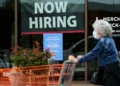 Workers at a U.S. business following release of the June employment report. - AP Photo/Nam Y. huh, File