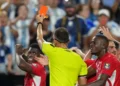Match officials review a VAR decision during the FIFA World Cup. - AP Photo/Ed Zurga