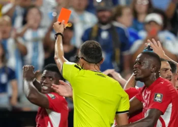 Match officials review a VAR decision during the FIFA World Cup. - AP Photo/Ed Zurga