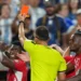 Match officials review a VAR decision during the FIFA World Cup. - AP Photo/Ed Zurga