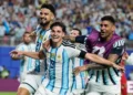 Julian Alvarez celebrates after scoring Argentina's extra-time winner against Switzerland. - AP Photo/Charflie Riedel