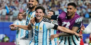 Julian Alvarez celebrates after scoring Argentina's extra-time winner against Switzerland. - AP Photo/Charflie Riedel