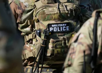 National Guard members and police respond to a shooting in downtown Memphis. - AP Photo/George Walker IV, File