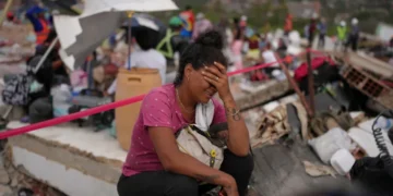 Medical workers treat earthquake survivors at a hospital in Caracas - AP Photo/Matias Delacroix
