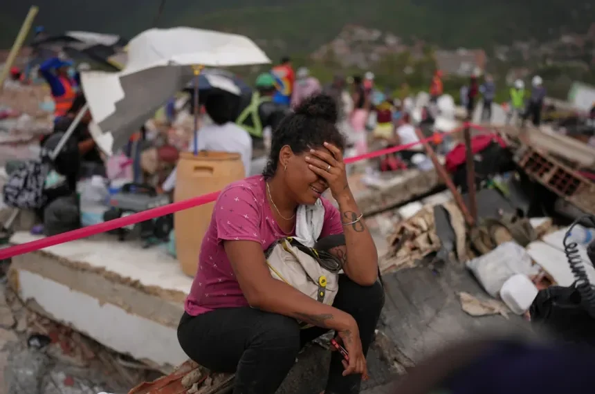 Medical workers treat earthquake survivors at a hospital in Caracas - AP Photo/Matias Delacroix