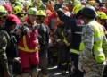 Rescue teams carry survivor from collapsed shopping center in Venezuela. - AP Photo/Fernando Vergara
