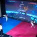 Athlete competing in Virtual Taekwondo using VR headset and motion sensors - AP Photo/Vincent Thian