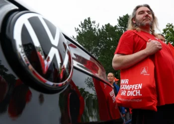 Volkswagen vehicles outside company headquarters amid restructuring announcement - Lisi Niesner/Pool Photo via AP
