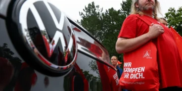 Volkswagen vehicles outside company headquarters amid restructuring announcement - Lisi Niesner/Pool Photo via AP