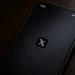 Screenshot of the X mobile application splash screen displayed on a smartphone, showing the X logo centered on a dark startup screen.