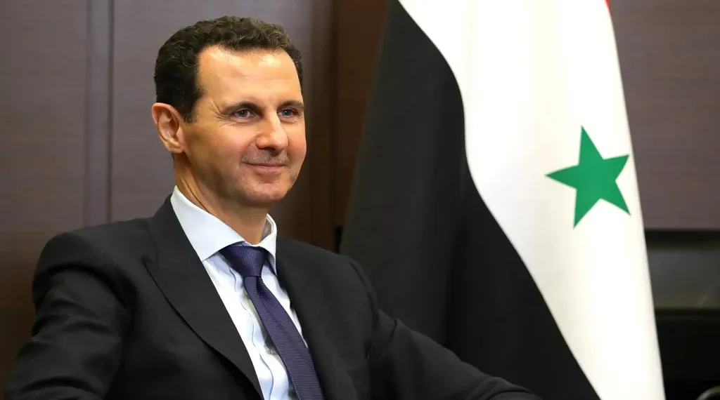 Bashar al-Assad meets Vladimir Putin during talks at the Kremlin in Moscow on May 17, 2018.