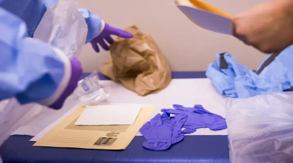 Personal protective equipment is arranged for medical staff during an Ebola response training exercise at an Army health clinic.