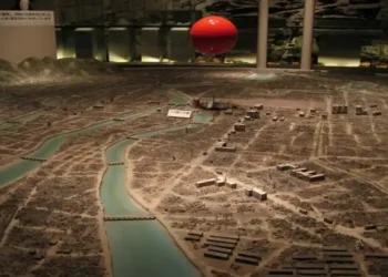 Diorama at Hiroshima Peace Memorial Museum showing the city after the atomic bomb blast, with a red marker indicating the blast location.