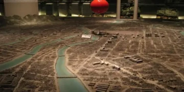Diorama at Hiroshima Peace Memorial Museum showing the city after the atomic bomb blast, with a red marker indicating the blast location.