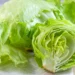 Fresh iceberg lettuce displayed for sale at a grocery store during the CDC investigation into a multistate Cyclospora outbreak linked to recalled lettuce.