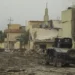 An Iraqi Special Operations Forces armored personnel carrier drives along a street in Mosul during the battle against Islamic State forces.
