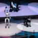 Unitree G1 humanoid robot, VISIONOID FOX animanoid and Unitree Go2 robot dog displayed at Japan Mobility Show 2025 in Tokyo.