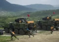 Former Taiwan President Tsai Ing-wen observes military personnel and equipment during the Han Kuang 32 military exercise in Pingtung County.