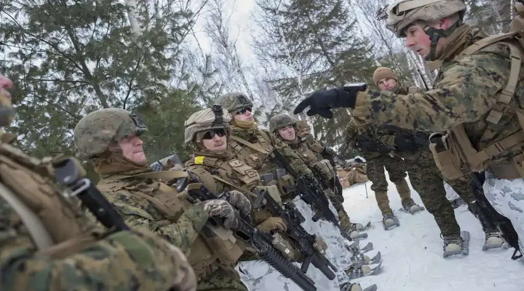 U.S. Marines prepare for a reconnaissance patrol during a joint cold-weather military exercise in Burwash, Ontario, Canada.