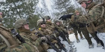 U.S. Marines prepare for a reconnaissance patrol during a joint cold-weather military exercise in Burwash, Ontario, Canada.
