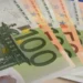 100 euro banknote displayed as a currency reference image, showing the denomination and design of the euro currency.