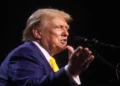 Donald Trump speaks with attendees at a Chase the Vote rally at Dream City Church in Phoenix, Arizona.
