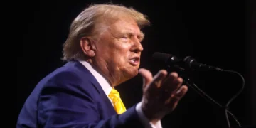 Donald Trump speaks with attendees at a Chase the Vote rally at Dream City Church in Phoenix, Arizona.