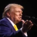 Donald Trump speaks with attendees at a Chase the Vote rally at Dream City Church in Phoenix, Arizona.