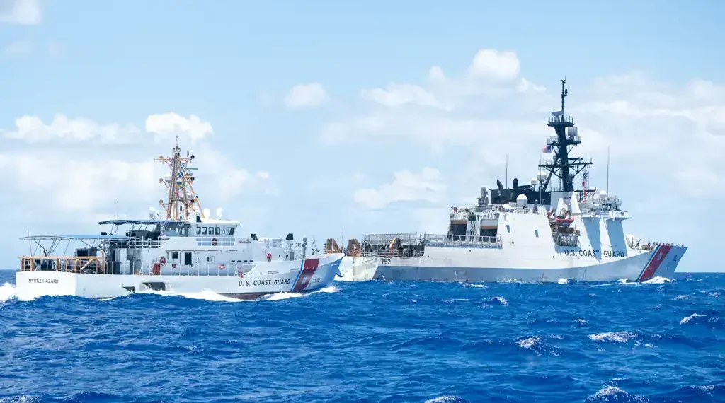 U.S. Coast Guard cutters Stratton and Myrtle Hazard transit the Philippine Sea near Guam during an Indo-Pacific patrol.
