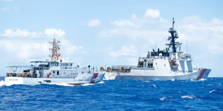 U.S. Coast Guard cutters Stratton and Myrtle Hazard transit the Philippine Sea near Guam during an Indo-Pacific patrol.
