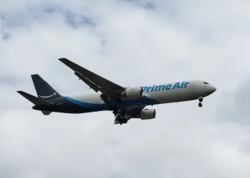 Amazon Air Boeing 767-300F operated by 21 Air approaches Miami International Airport in Miami, Florida.
