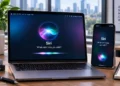 Apple Siri AI assistant displayed on a laptop and smartphone, illustrating voice-based digital assistance across devices.