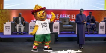 Ayo, the lion mascot of the Dakar 2026 Youth Olympic Games, representing Senegalese youth and the first Olympic event in Africa.