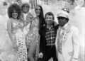 Bob Mackie poses with Bette Midler, Elton John, Cher and Flip Wilson during a 1975 television special taping at CBS Television City.