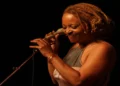 Alt Text: Cassandra Wilson appears in a portrait photograph, documenting the American jazz vocalist and musician.