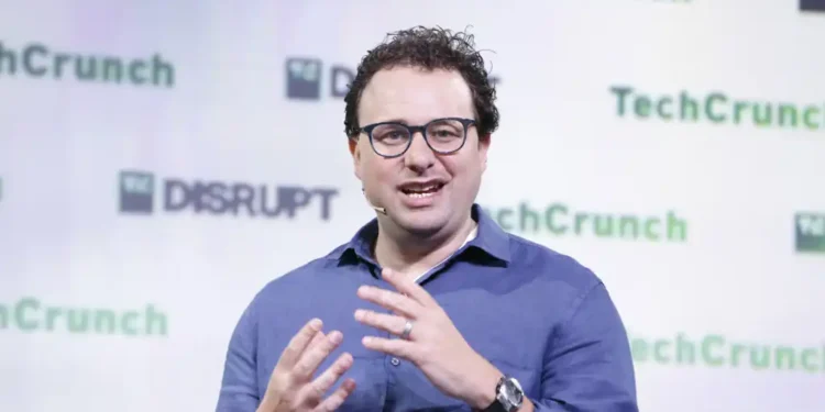Dario Amodei speaks at TechCrunch Disrupt 2023 during a technology industry event in San Francisco, California.